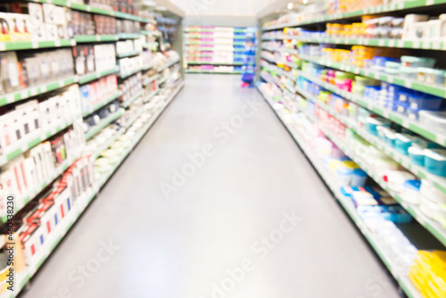 Market shop or supermarket interior as blurred store background