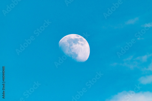Moon on the blue sky during the day in Ireland photo
