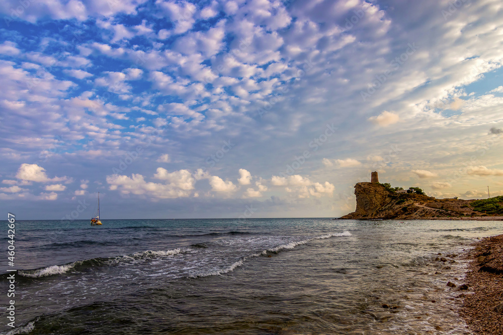 Watchtower next to the Mediterranean sea located in the xarco beach, Villajoyosa, Alicante, Spain