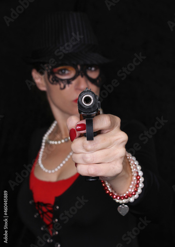 Woman Wearing Lace Mask With Gun Shallow DOF focus on Gun Gangster Styler