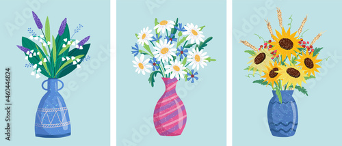 flower bouquets in wrapping and blooming plant. gerberas and chamomile, strawberry. tulip composition. Decorative florist shop item.