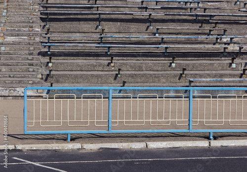 Part of the old grandstand at the stadium. Old wooden benches for sitting. 