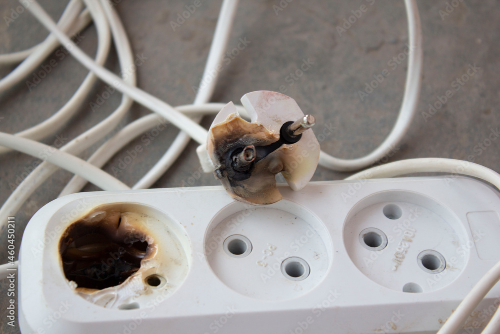 the plug and socket burned melted short circuit Stock Photo Adobe Stock
