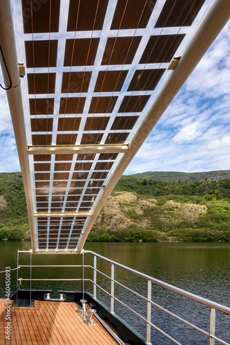 Partial view of solar panels that power the Sanabria lake environmental cruise in Lake Sanabria, Spain. photo