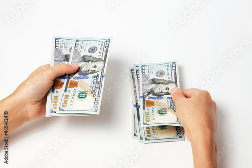 Woman counting dollars money, top view