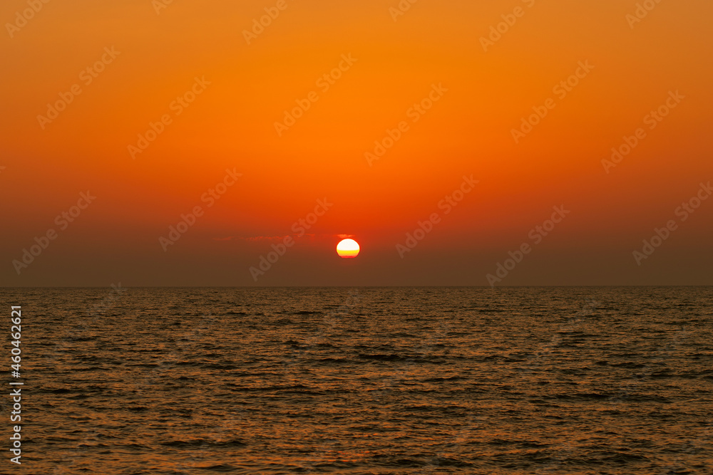 sunset sea Jamaica,sun sets in the ocean landscape,background from the beach