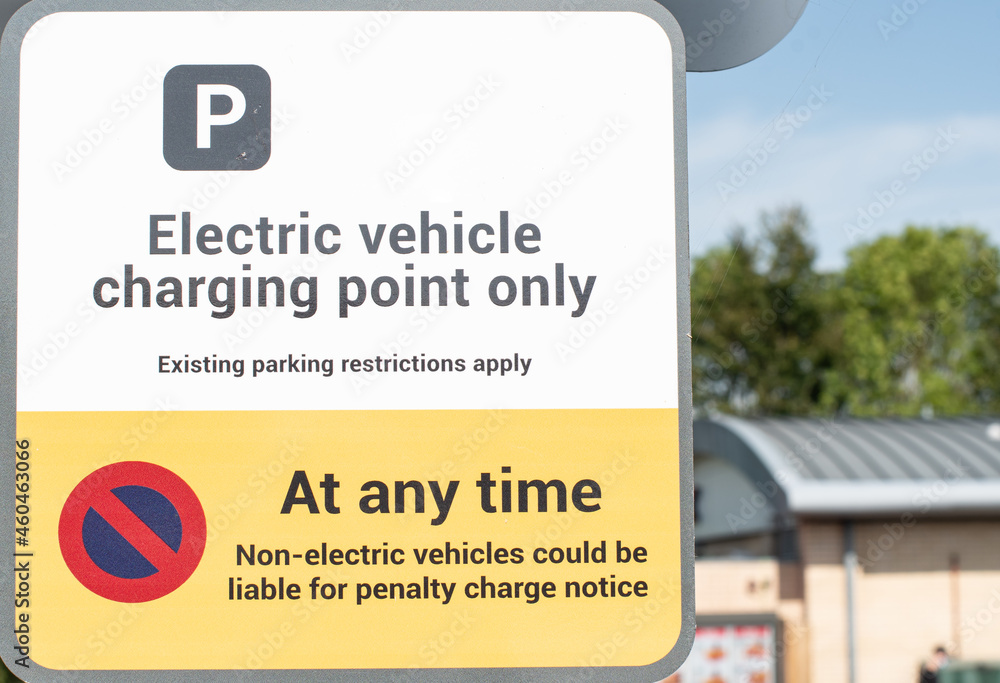 Notice warning of parking restrictions for non electric vehicles parking in an electric vehicle charging bay Notice warning of parking restrictions for non electric vehicles parking in an electric vehicle charging bay
