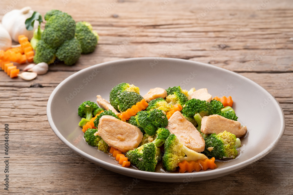 Stir Fried Broccoli with chicken breast and carrot in oyster sauce.Thai food Stir Fried Broccoli with chicken breast and carrot in oyster sauce.Thai food