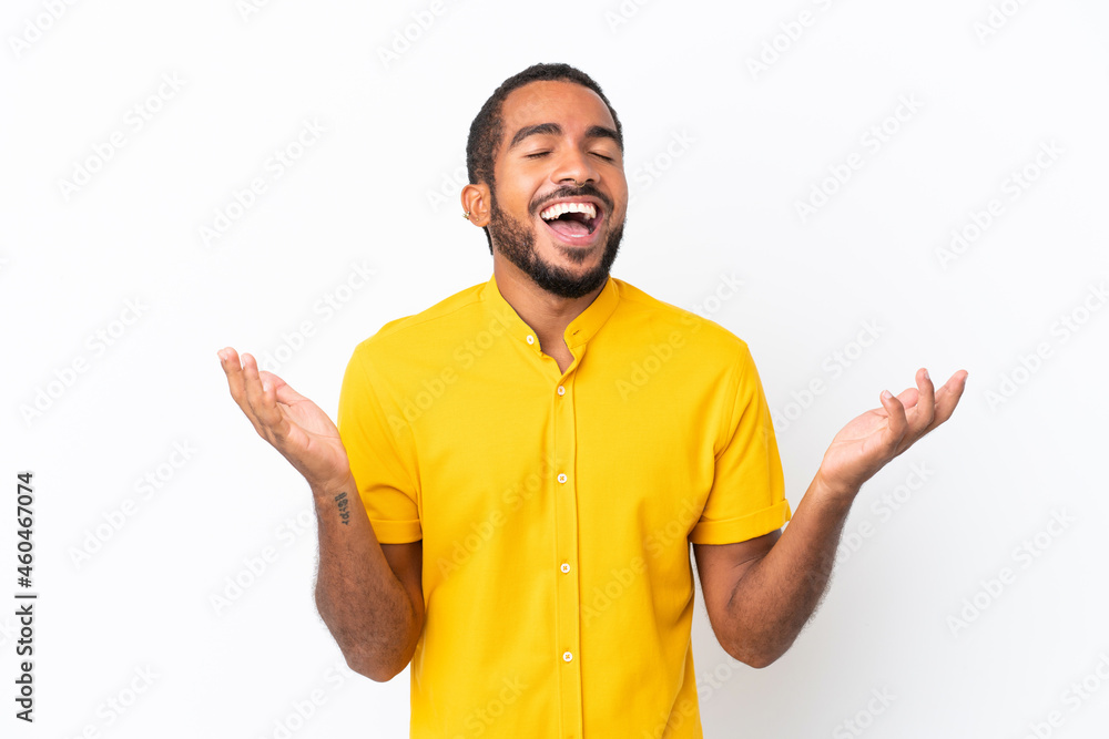 Young Ecuadorian man isolated on white background smiling a lot Young Ecuadorian man isolated on white background smiling a lot
