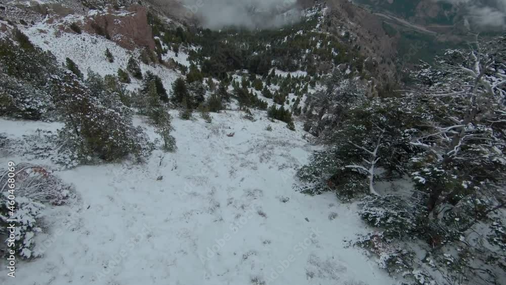 FPV drone Mountain surfing over snowy mountain FPV drone Mountain surfing over snowy mountain