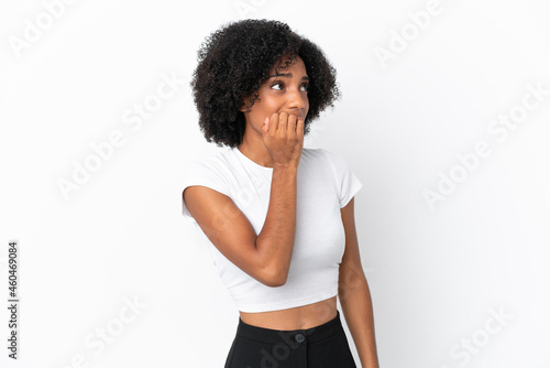 Young African American woman isolated on white background is a little bit nervous