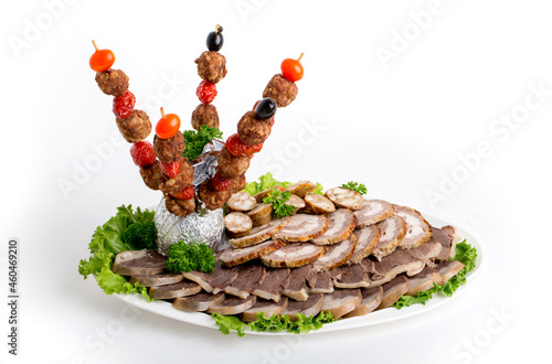 The cold cuts are beautifully served in the restaurant. Sausage Meat Kazy is a national dish of the Kazakh peoples, Horse meat. Delicacy of Kazakhstan. photo