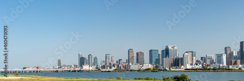 View of office buildings of central Osaka city from Yodogawa river bank photo