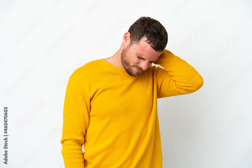 Young Brazilian man isolated on white background with neckache Young Brazilian man isolated on white background with neckache