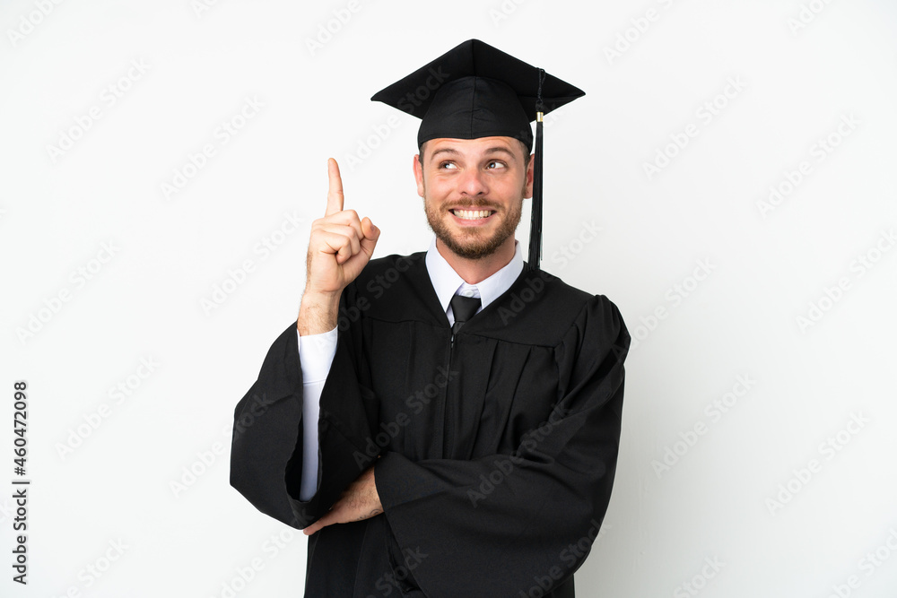 Young university Brazilian graduate isolated on white background pointing up a great idea Young university Brazilian graduate isolated on white background pointing up a great idea