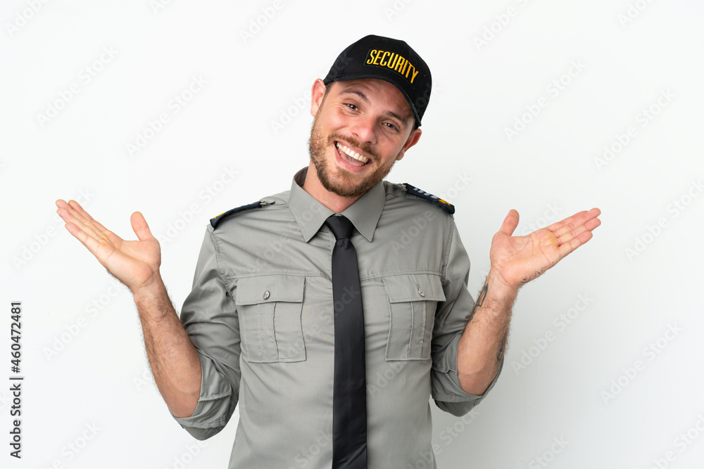 Young security Brazilian man isolated on white background with shocked facial expression Young security Brazilian man isolated on white background with shocked facial expression