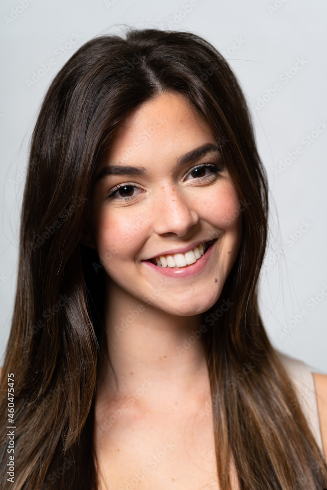 Teenager Brazilian girl over isolated background Teenager Brazilian girl over isolated background