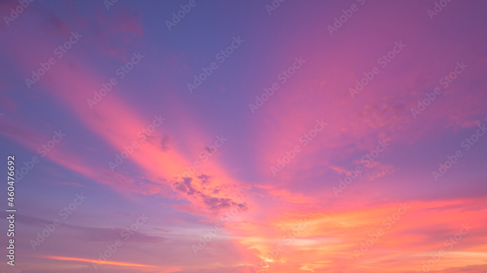 Amazing sunset.Colorful sky in the sunset. Natural Sunset Sunrise Over Field Or Meadow. Bright Dramatic Sky And Dark Ground.
