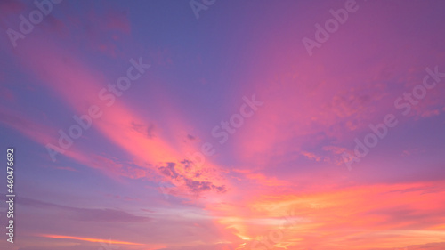 Amazing sunset.Colorful sky in the sunset. Natural Sunset Sunrise Over Field Or Meadow. Bright Dramatic Sky And Dark Ground.