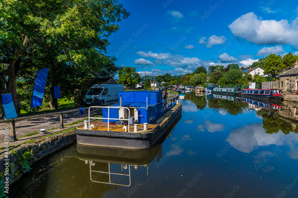 Fototapeta premium A view from the top of the Five Locks network on the Leeds, Liverpool canal at Bingley, Yorkshire, UK in summertime
