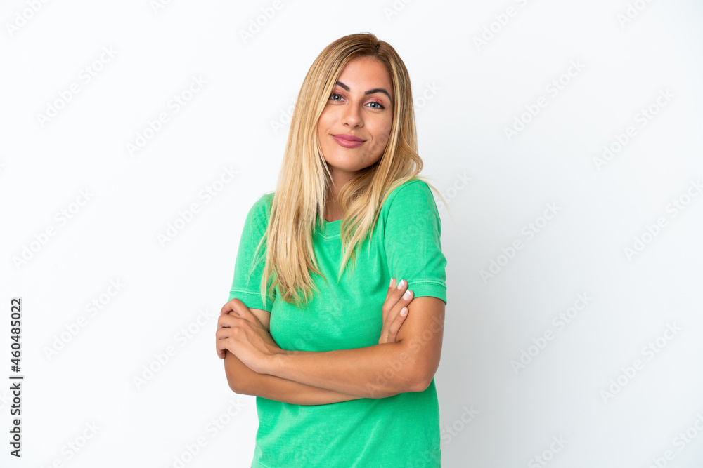 Blonde Uruguayan girl isolated on white background making doubts gesture while lifting the shoulders Blonde Uruguayan girl isolated on white background making doubts gesture while lifting the shoulders
