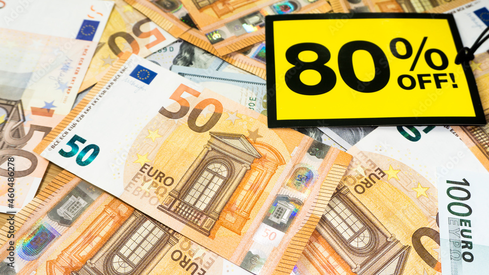 Yellow sale label on money euro background. Black friday sale. European money