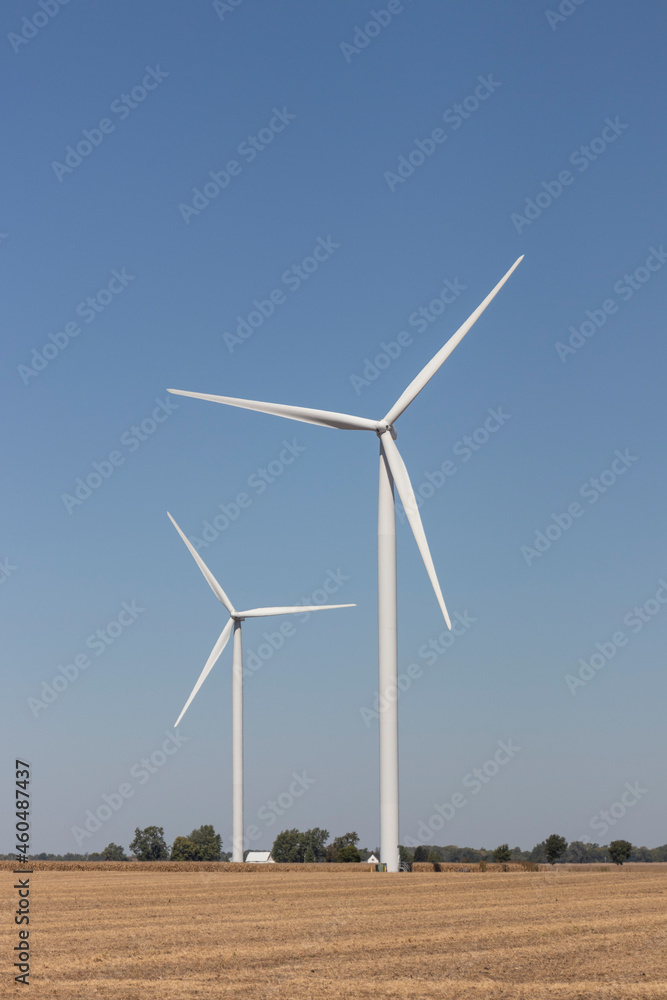 Wind Turbine Farm in Central Indiana. Wind and Solar Green Energy areas are becoming very popular in farming communities. Wind Turbine Farm in Central Indiana. Wind and Solar Green Energy areas are becoming very popular in farming communities.