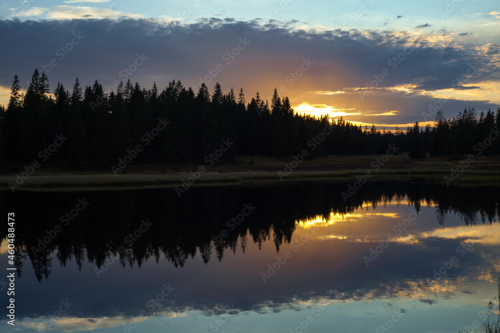 Fototapeta premium sunset over the lake