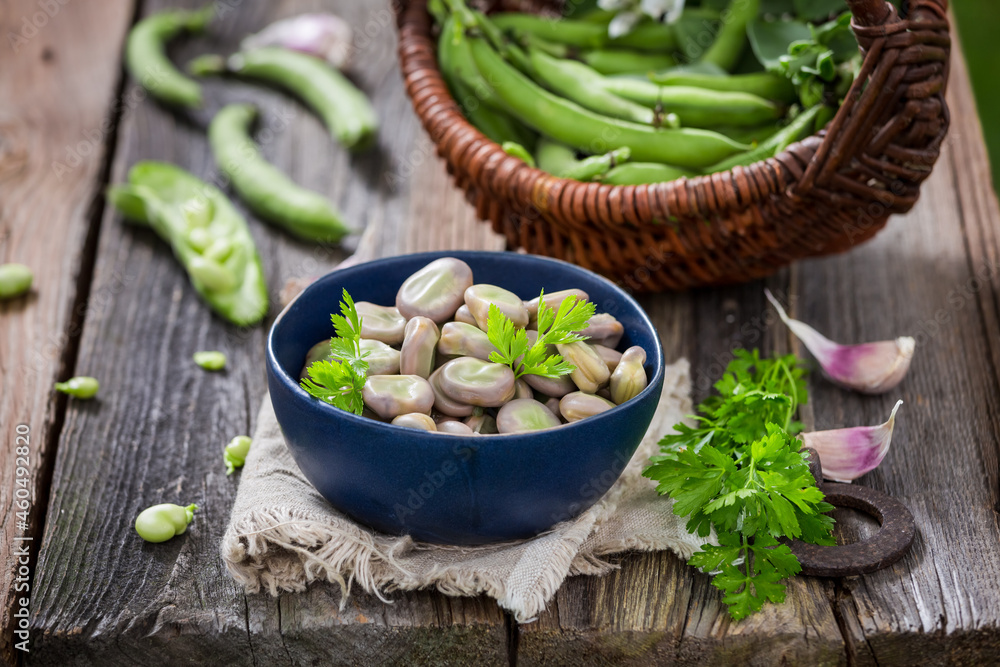 Tasty broad beans with parsley and garlic. Healthy country snack. Tasty broad beans with parsley and garlic. Healthy country snack.