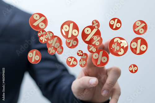 sale digital percent in hand.