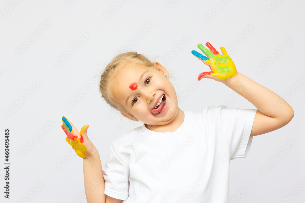 beautiful little girl with hands in the paint beautiful little girl with hands in the paint