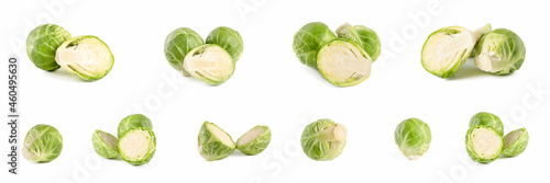 Brussels sprouts. Large set of fresh brussels sprouts in stacks on a white isolated background. Deep focus stacking.