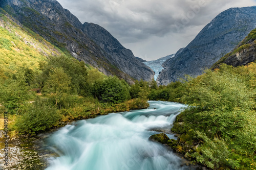 Hiking to Briksdalsbreen  Briksdal glacier   one of the most accessible and best known arms of the Jostedalsbreen glacier  Jostedalsbreen National Park  Vestland  Norway.