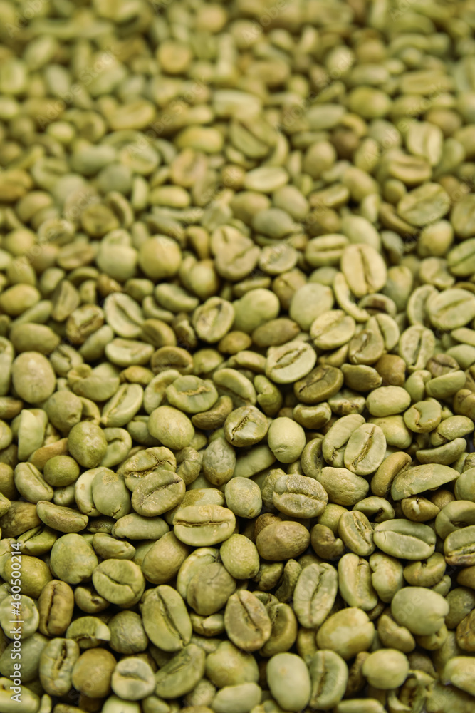 Pile of green coffee beans as background, closeup Pile of green coffee beans as background, closeup