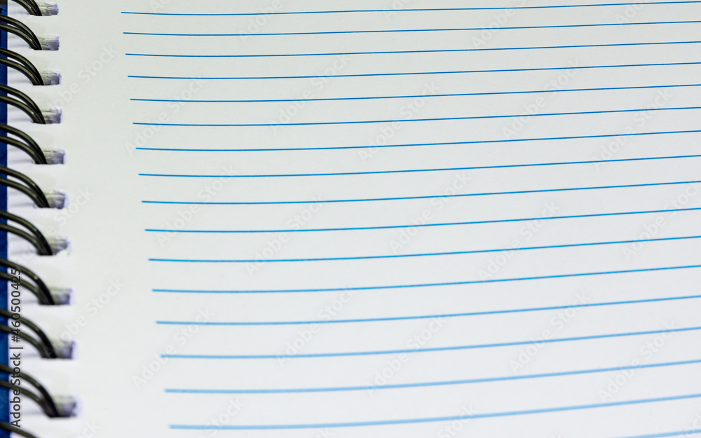 Open blank lined page notebook, Striped notebook paper texture. Paper Background. Selective focus Open blank lined page notebook, Striped notebook paper texture. Paper Background. Selective focus