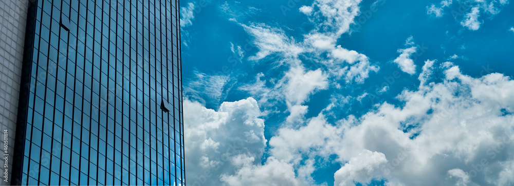Skyscraper windows cloudy copy space.. Tower block. Skyscraper windows cloudy copy space.. Tower block.