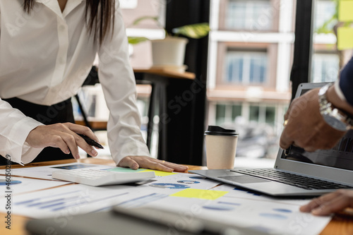 Atmosphere in the meeting room of startup companies, executives and sales departments gather together to summarize sales for analysis and planning. Sales management concept of startup company.