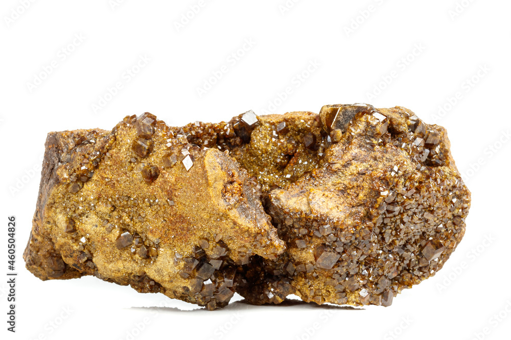Macro mineral stone Garnet, Green Garnet, Epidote Grossular in the rock on a white background Macro mineral stone Garnet, Green Garnet, Epidote Grossular in the rock on a white background