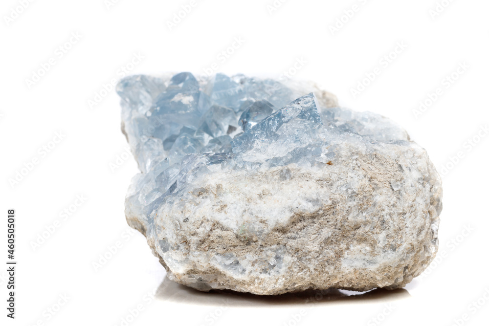 Macro mineral stone Celestine in the breed a white background Macro mineral stone Celestine in the breed a white background