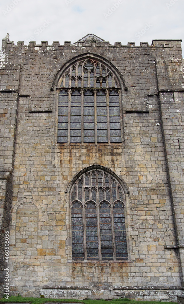 old window on the historic medieval cartmel priory in cumbria now the parish church of st micheal and mary