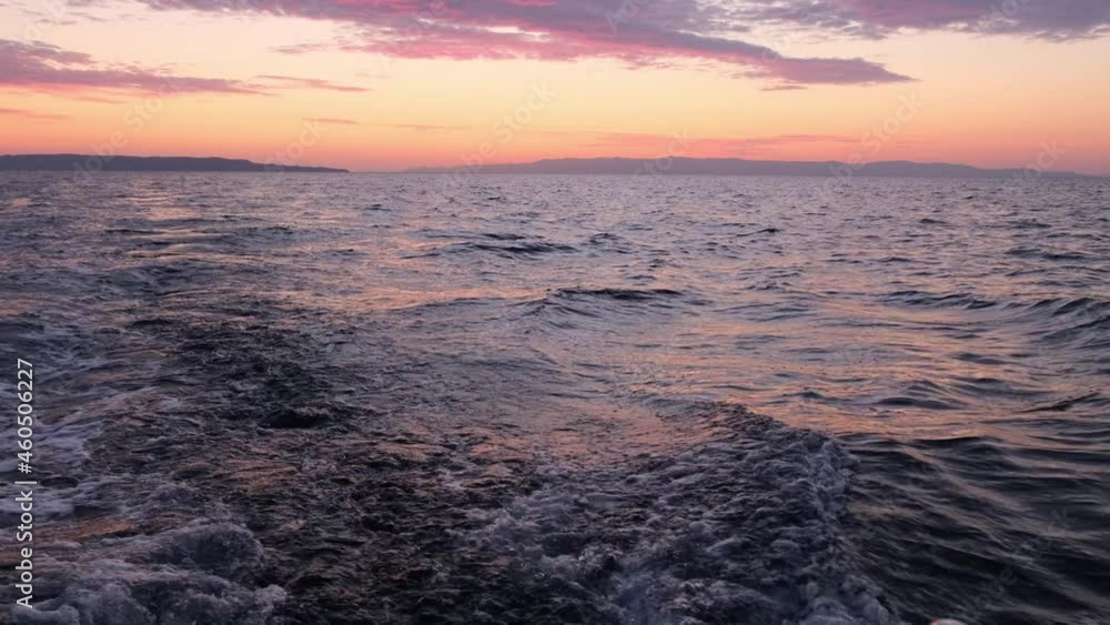 Sun rises over sea waves at early morning Sun rises over sea waves at early morning