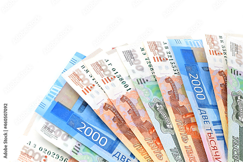 Russian banknotes are fanned out, isolated on a white background. Currency exchange. Money background. Financial crisis, ruble devaluation concept. Russian banknotes are fanned out, isolated on a white background. Currency exchange. Money background. Financial crisis, ruble devaluation concept.