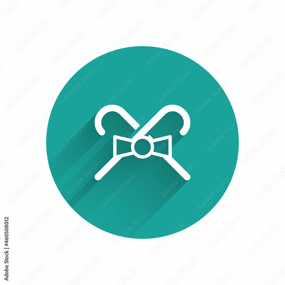 White Christmas candy cane with stripes icon isolated with long shadow. Merry Christmas and Happy New Year. Green circle button. Vector