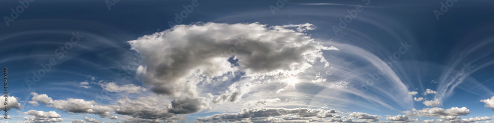 blue sky hdri 360 panorama with white beautiful clouds in seamless projection with zenith for use in 3d graphics or game development as sky dome or edit drone shot for sky replacement