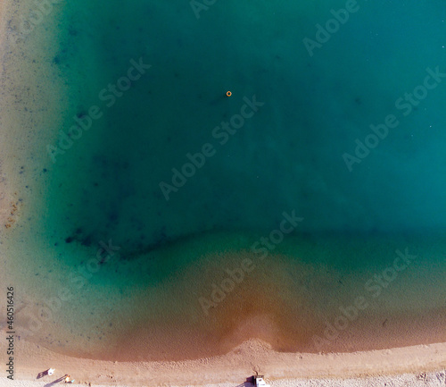 Fototapeta Naklejka Na Ścianę i Meble -  Sea Aerial view, Top view,amazing nature background.The color of the water and beautifully bright. Azure beach  at sunny day.flying drone,sea view