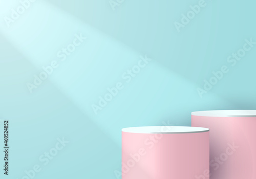 3D pink and white cylinder pedestal in soft blue empty room with light and shadow background © rarinlada