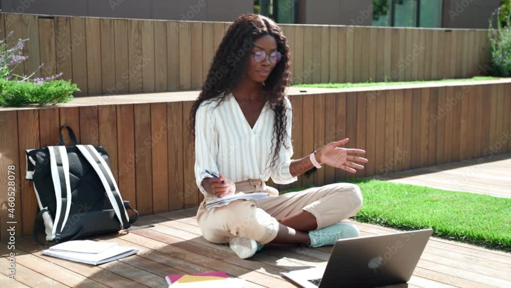 Young happy black African woman university student learning online ...