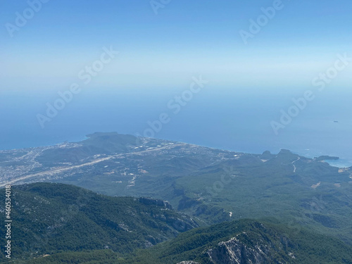 Beautiful view of the sea and mountains. A bird`s-eye view of the rocky coast. Top view