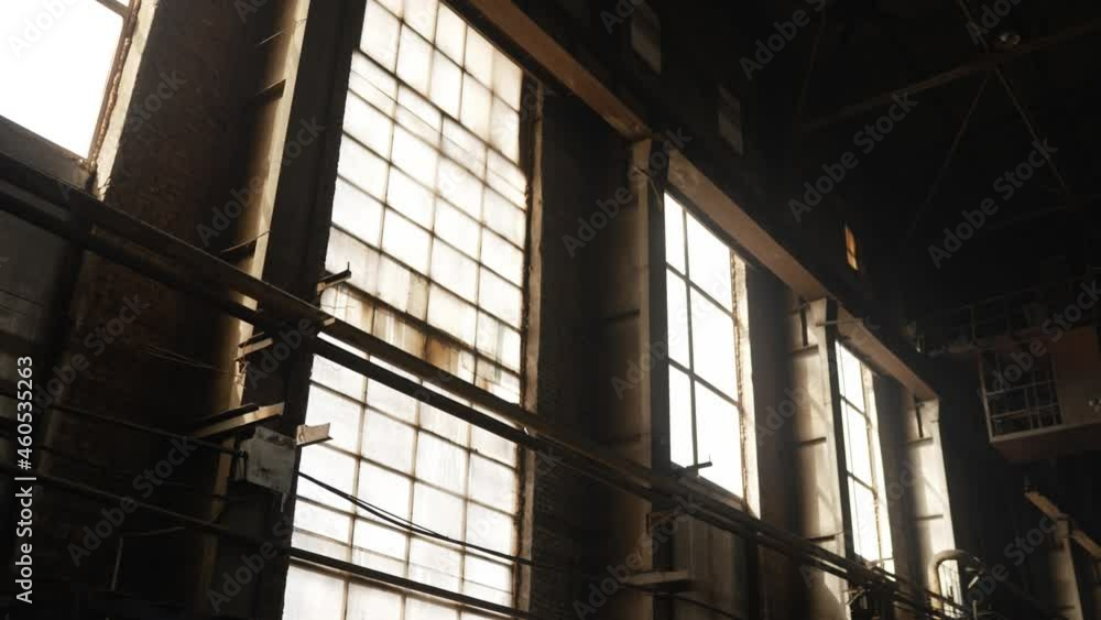 Abandoned power plant with large windows - Abandoned factory. Industrial plant with large windows. Abandoned power plant with large windows - Abandoned factory. Industrial plant with large windows.