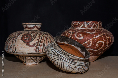 Reproduction of Cucuteni Culture ceramic pots with traditional decorative paint. photo